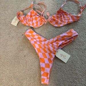 Never worn pink and orange bikini